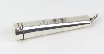 A silver cheroot case containing
