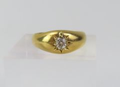 An early 20th century diamond set gypsy ring, the