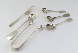A collection of silver flatware