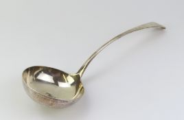 A large Victorian silver ladle