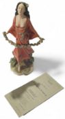 A Capodimonte figure of a walking female in a Bohe