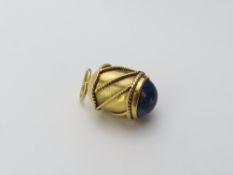 An unusual pendant, of barrel form with rope decor
