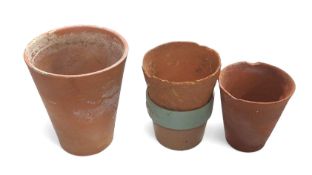 Two crates of small terracotta plant pots