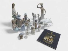 A collection of Lladro and Lladro Nao figurines, a
