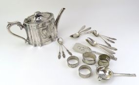a collection of silver and silver-plated items