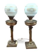 A pair of converted brass oil lamps