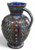 A Doulton Lambeth stoneware jug, in typical blue a