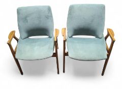 A pair of mid century style armchairs