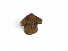 A Japanese lacquer and ivory netsuke, the figure w
