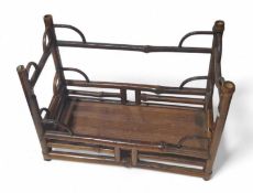A bamboo apprentice table, with rounded corner pie