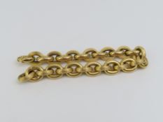 An unmarked gold oval link bracelet