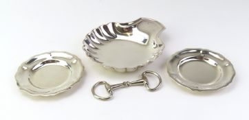 A white-metal Christofle shell-shaped dish