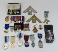 A collection of Masonic jewels, such as a Mark Mas