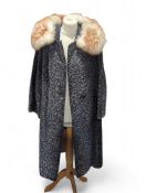 A vintage grey faux lambs wool ladies coat, with a