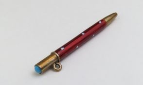 An enamelled miniature propelling pencil, the red