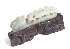 A Chinese very pale hardstone (possibly jade) carv