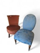 A reddish buff slipper chair