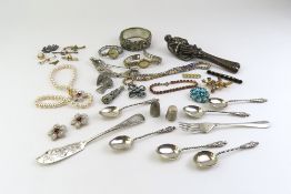 A collection of costume jewellery and silver items