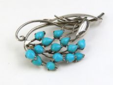A 20th century brooch in the form of a flower, the