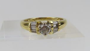 An 18ct gold diamond solitaire ring