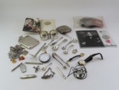 A collection of silver, silver plate, coins, watch