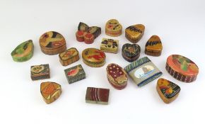A collection of variously shaped and themed trinke