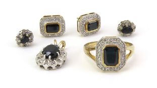 A 9ct gold step cut sapphire and diamond cluster r