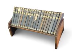 A collection of Sir Walter Scott books arrayed in