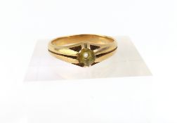 A ring mount with indistinct marks and line decora
