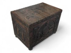 A 19th century heavily carved oak chest