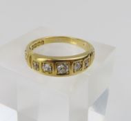 An old cut diamond five stone ring