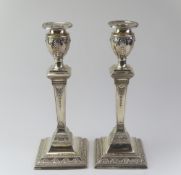 A pair of Victorian silver candlestick holders