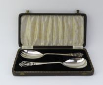 A cased silver serving spoon and fork