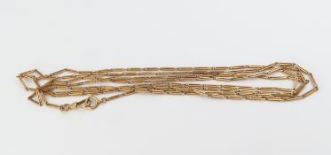 A rose gold ladies guard chain, with fancy figaro