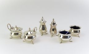 A collection of silver cruet items