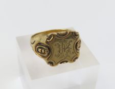 An unmarked square head signet ring with K.E engra