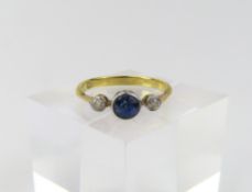 An early 20th century sapphire and diamond three s