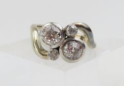 An unusual white gold old cut diamond ring, the tw
