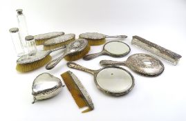 A collection of silver dressing table items