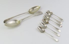 A collection of silver spoons