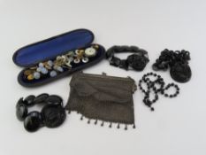 A set of ten gilt metal and enamel buttons decorat