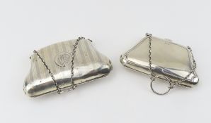 A pair of silver purses