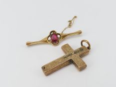 An early 20th century 9ct gold bar brooch set with