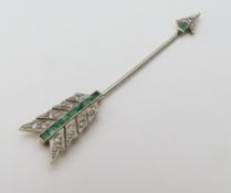 A 20th century arrow shaped jabot pin, the tip of