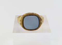 A gold, square head, sardonyx set signet ring, mar