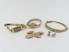 A ladies 9ct gold cased mechanical wristwatch on a