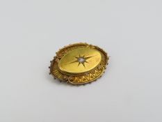 A late 19th or early 20th century mourning brooch,