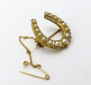 A Victorian unmarked yellow metal split pearl broo