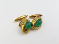 A pair of mid-20th century cufflinks, the oval sha