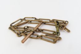 An unmarked rose metal watch chain, comprised of t